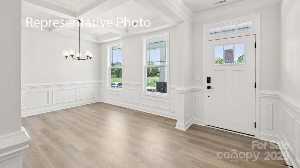 7633 Bainbridge Road Sherrills Ford, NC 28673 - Photo 2 of 34 a view of an entryway with wooden floor