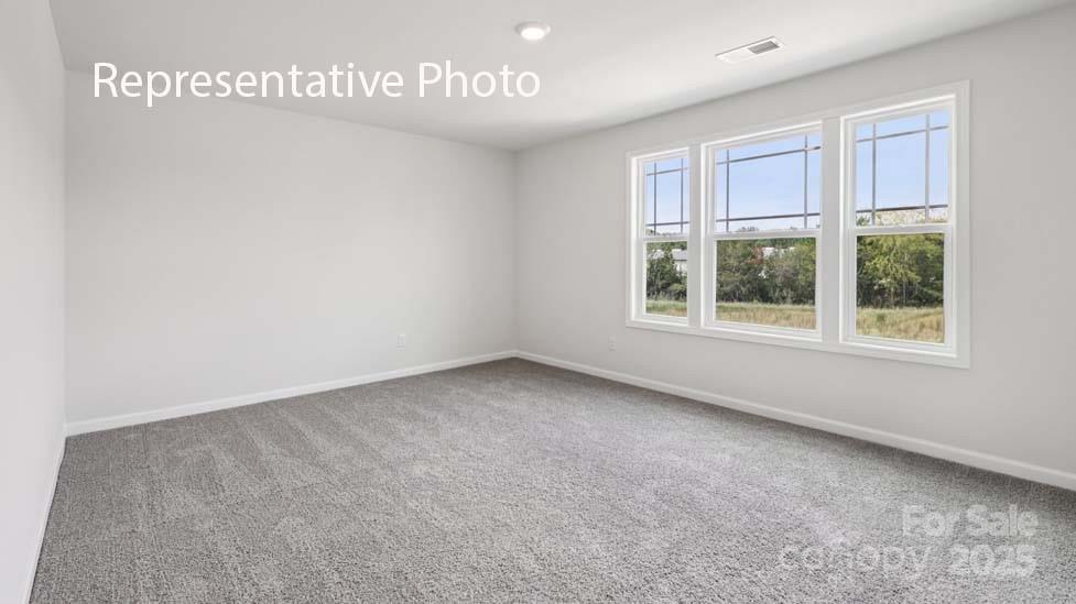 7633 Bainbridge Road Sherrills Ford, NC 28673 - Photo 22 of 34 a view of an empty room with a window