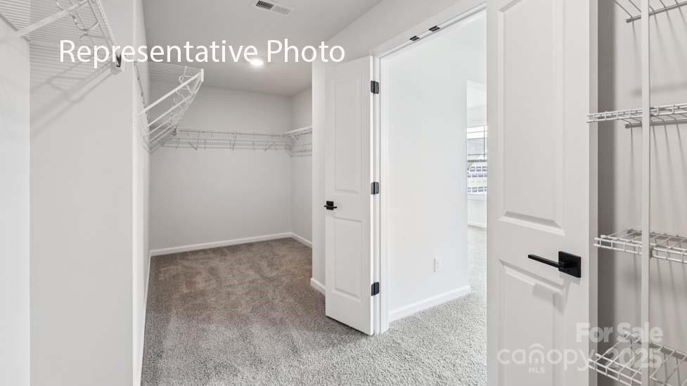 7633 Bainbridge Road Sherrills Ford, NC 28673 - Photo 30 of 34 a view of a hallway with closet