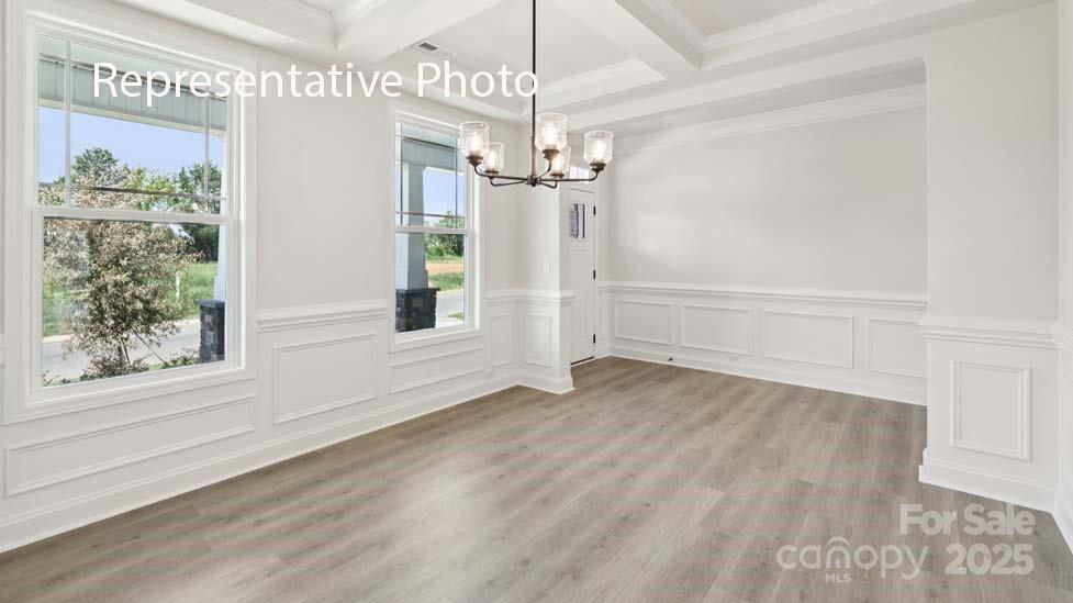 7633 Bainbridge Road Sherrills Ford, NC 28673 - Photo 3 of 34 a view of a chandelier in an empty room