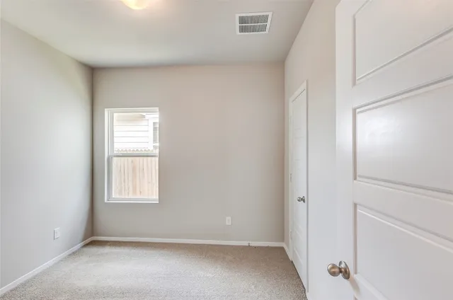 a bathroom with a sink a tub and a mirror