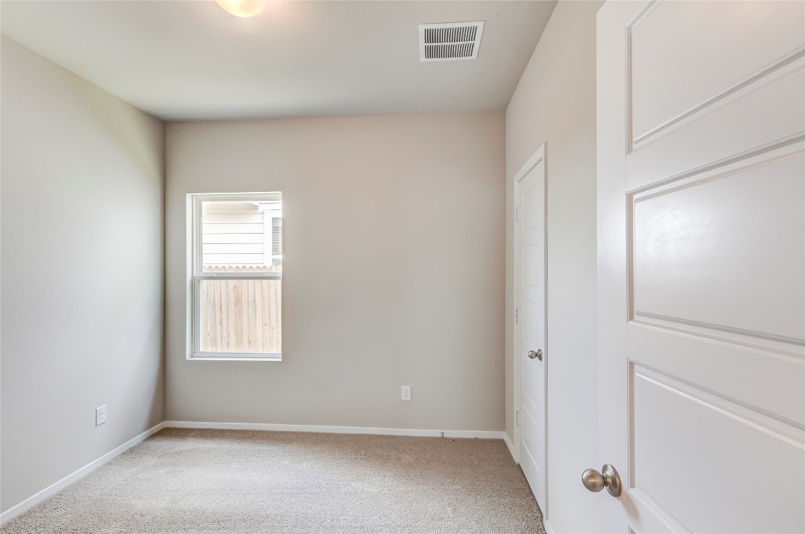 274 Jade Street Maxwell, TX 78656 - Photo 14 of 36 an empty room with windows