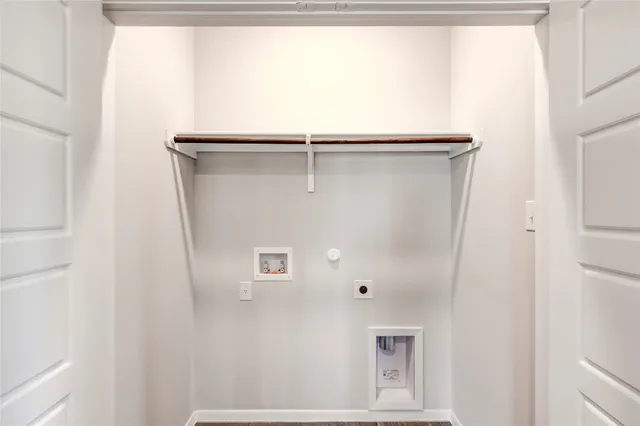 a bathroom with a bathtub shower sink vanity and toilet