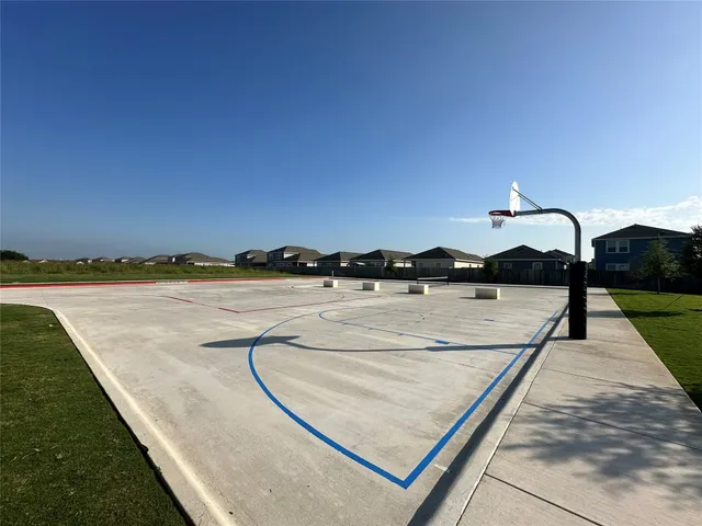 a view of a swimming pool and a chairs