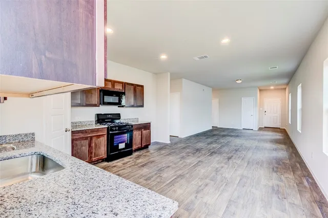 a view of a golf course with a lake