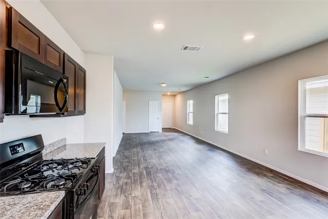a view of swimming pool with furniture
