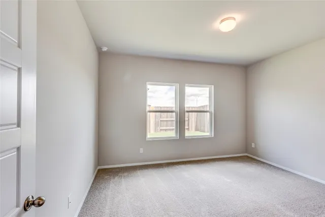 a kitchen with a stove and a microwave