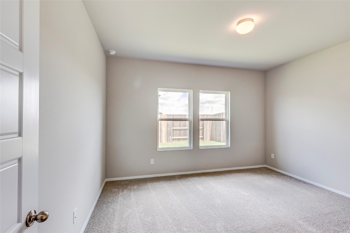274 Jade Street Maxwell, TX 78656 - Photo 6 of 36 an empty room with a window