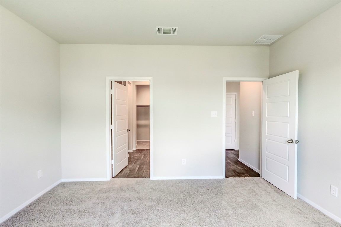 274 Jade Street Maxwell, TX 78656 - Photo 7 of 36 a view of a hallway to rooms
