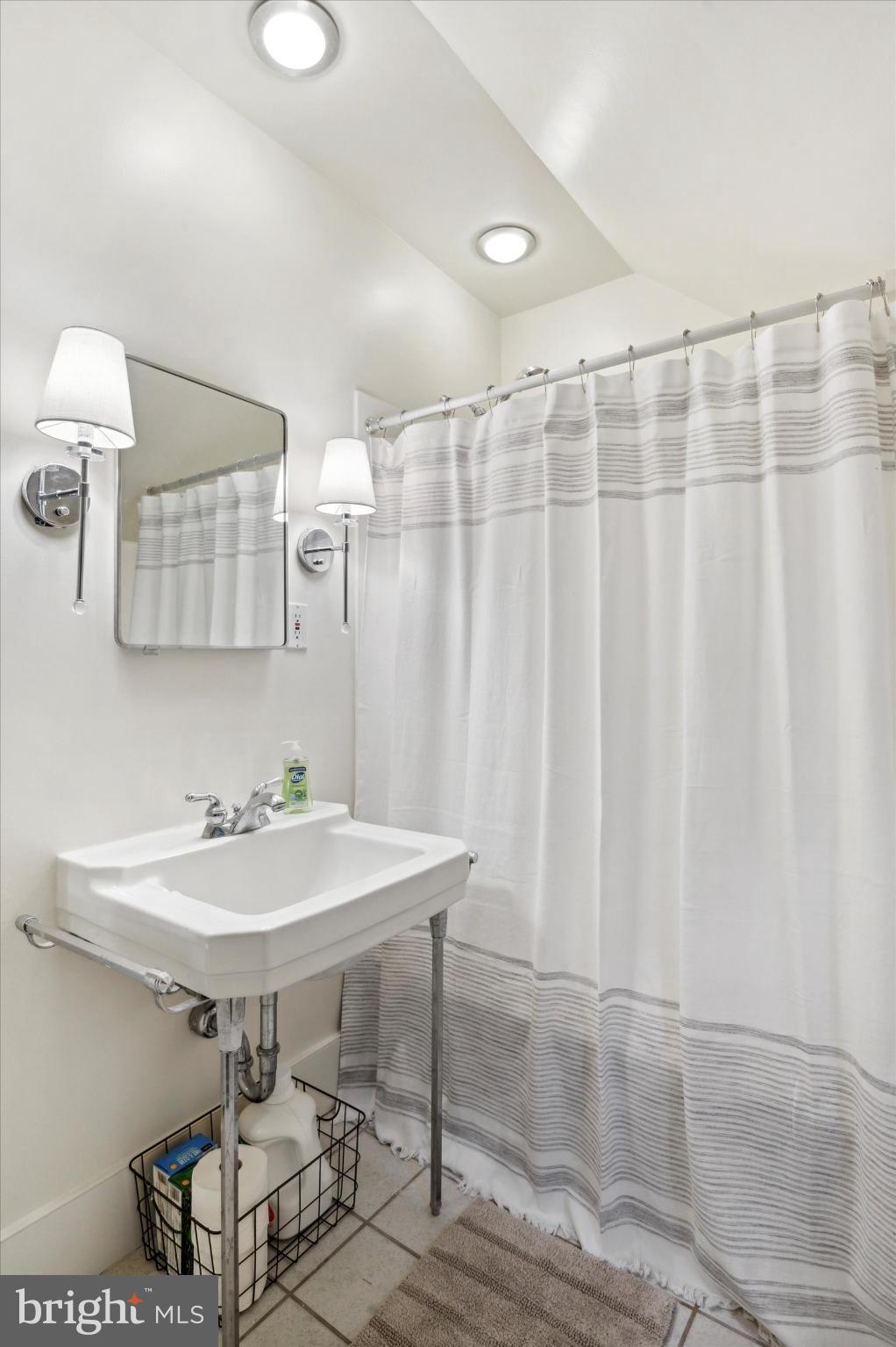 565 Upper Pike Creek Road Newark, DE 19711 - Photo 17 of 23 Modern bathroom with sleek design elements.