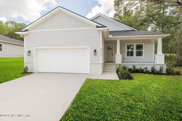 front view of house with a yard