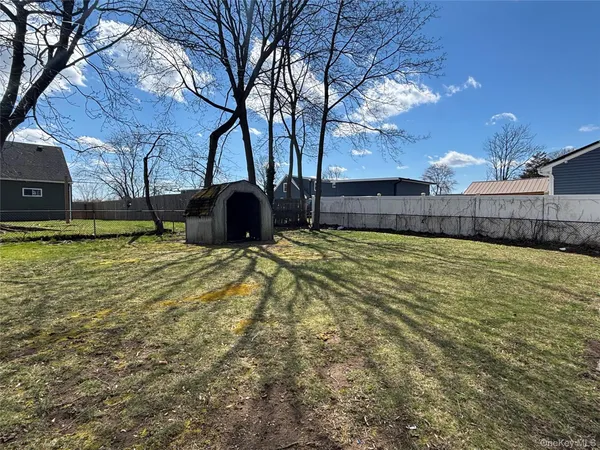 a view of a backyard of a house