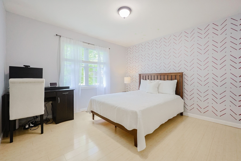 38 Tavern Road Groton, MA 01450 - Photo 11 of 25 a bedroom with a bed and a window
