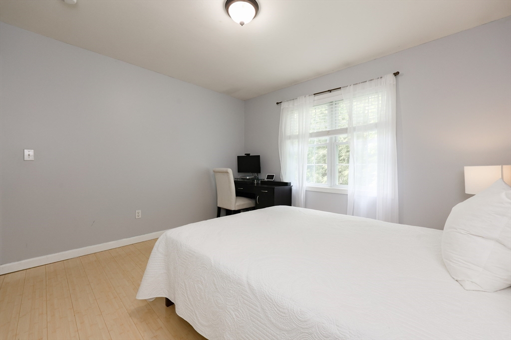 38 Tavern Road Groton, MA 01450 - Photo 12 of 25 a bedroom with a bed and a window