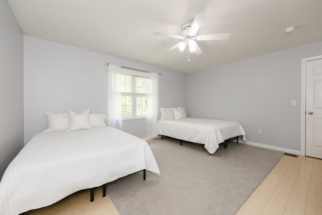 38 Tavern Road Groton, MA 01450 - Photo 14 of 25 a bedroom with a bed and window