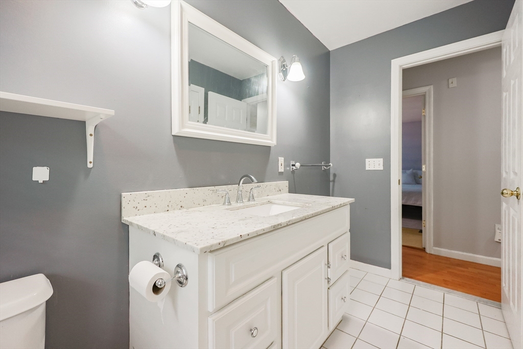 38 Tavern Road Groton, MA 01450 - Photo 15 of 25 a bathroom with a sink vanity and a mirror