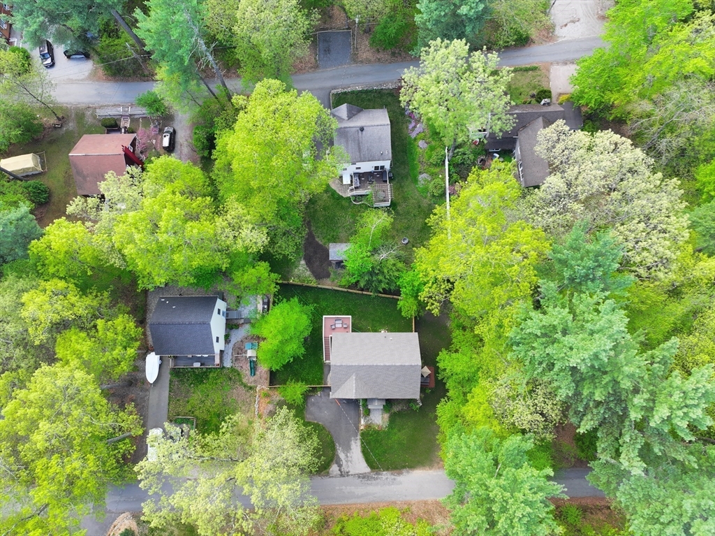 38 Tavern Road Groton, MA 01450 - Photo 25 of 25 an aerial view of a house with a yard and garden