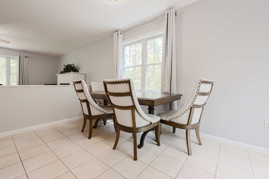 38 Tavern Road Groton, MA 01450 - Photo 8 of 25 a dining room that has a table and chairs in it