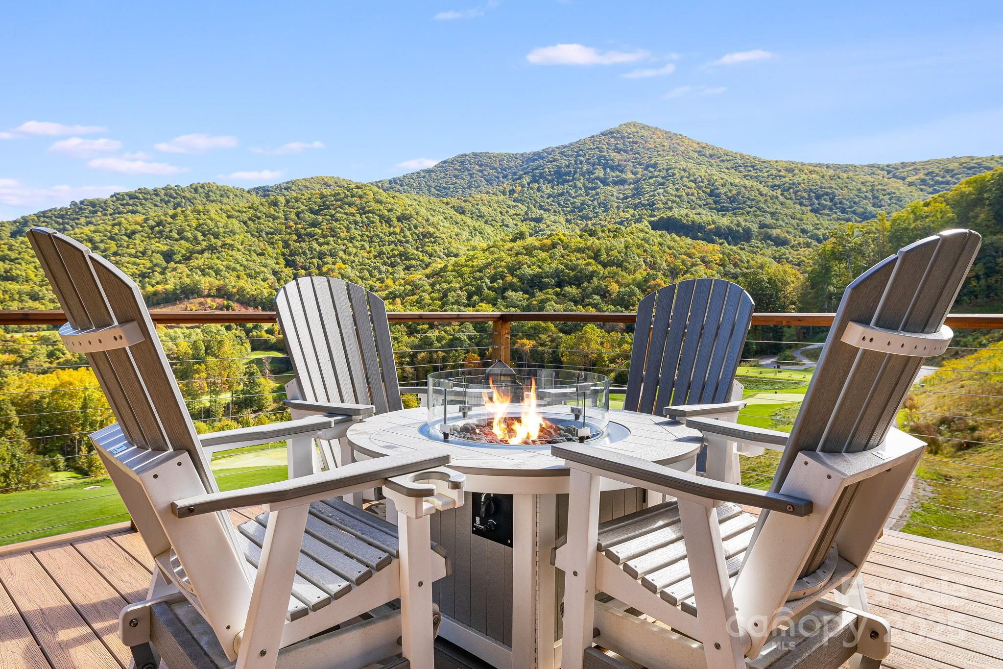 13 Switchgrass Way, Unit 407 Sylva, NC 28779 - Photo 13 of 48 a view of city from balcony with furniture