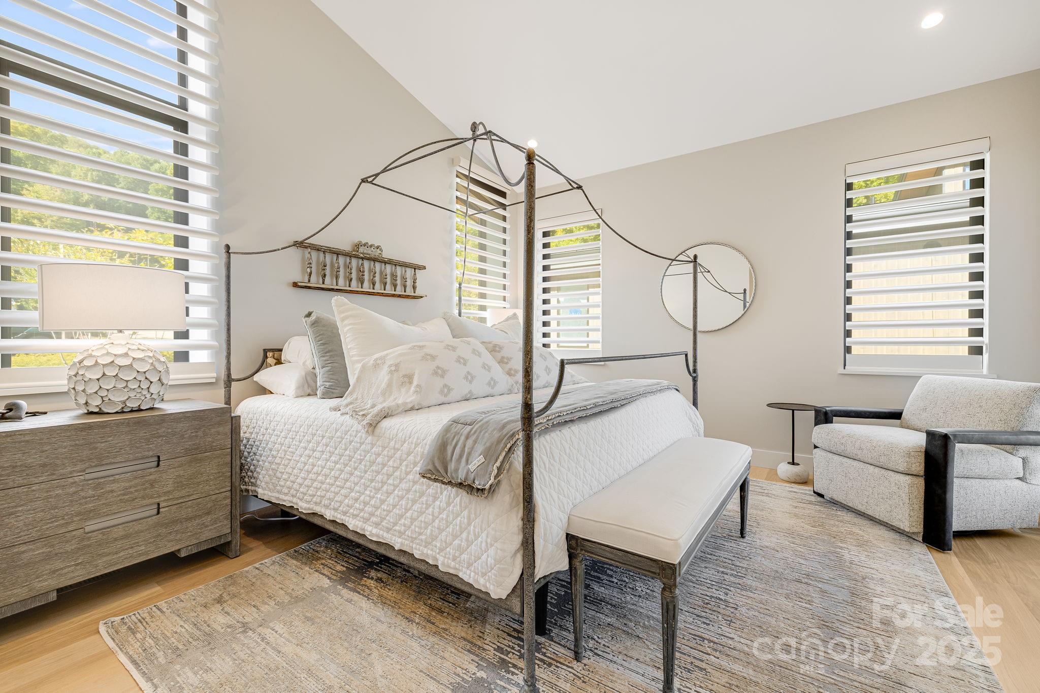 13 Switchgrass Way, Unit 407 Sylva, NC 28779 - Photo 14 of 48 a bedroom with furniture and a window