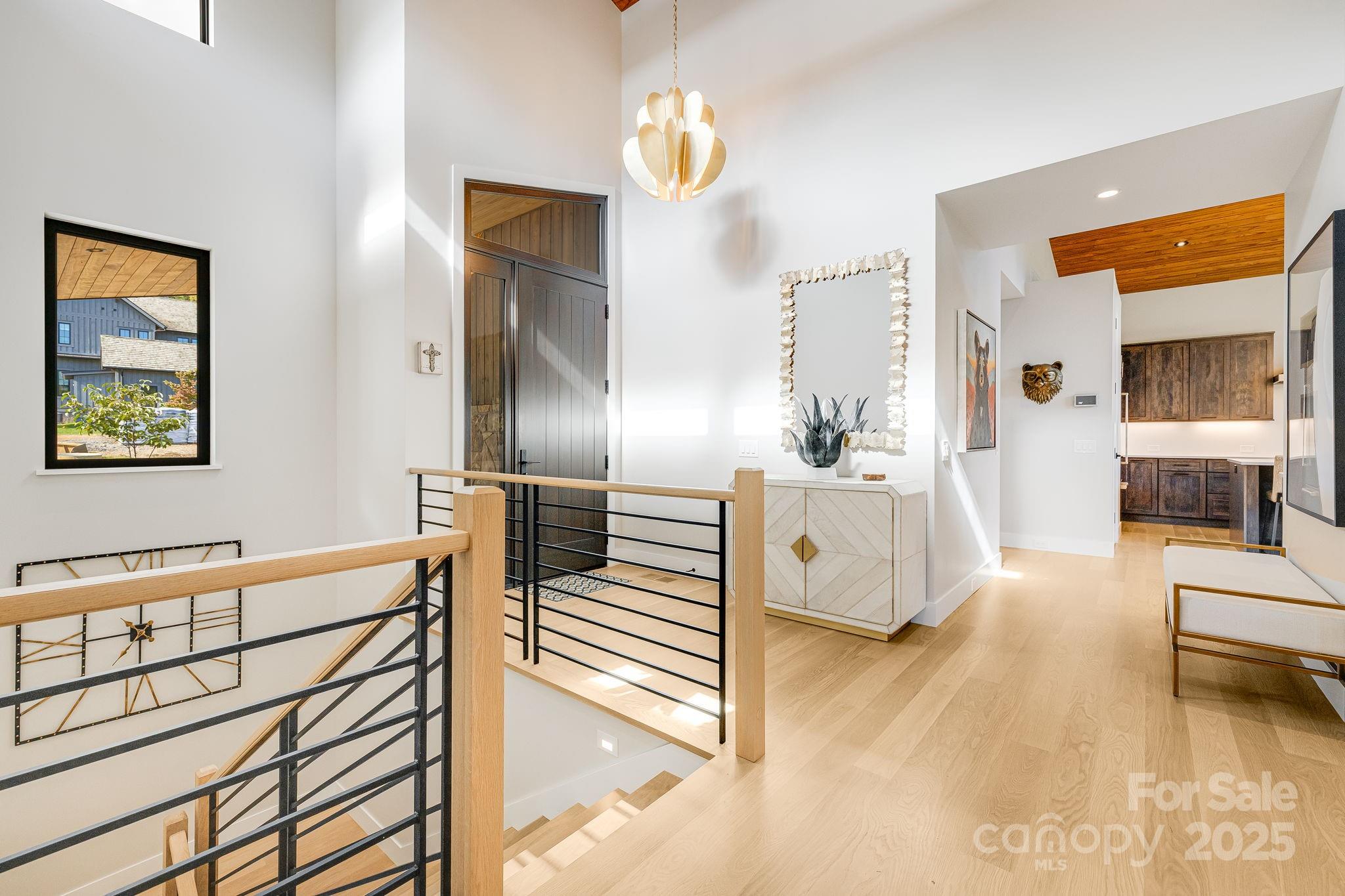 13 Switchgrass Way, Unit 407 Sylva, NC 28779 - Photo 4 of 48 a spacious bedroom with a bed and a view of bedroom