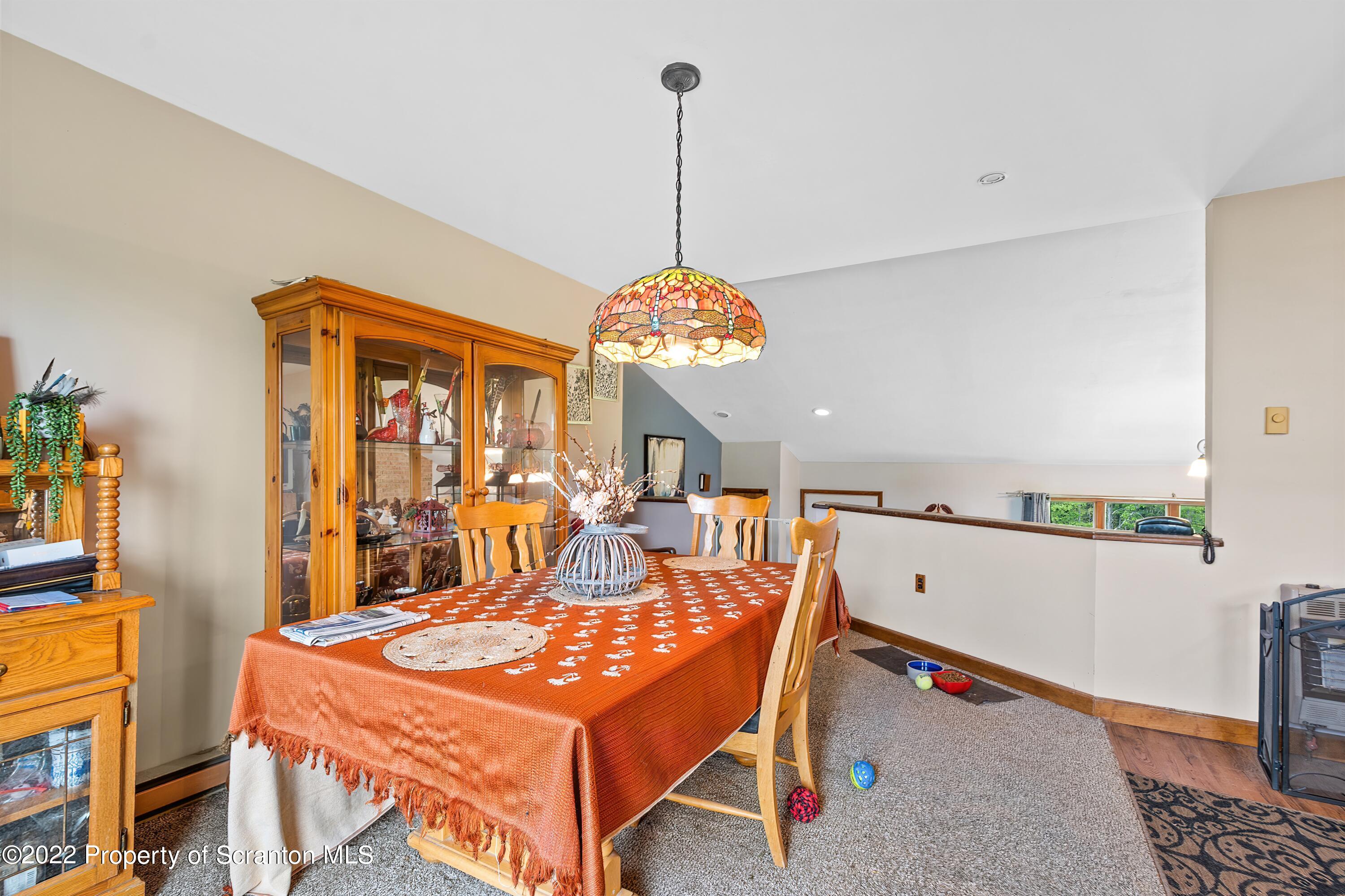 116 Hack Road Dalton, PA 18414 - Photo 14 of 33 a dining room with furniture and window