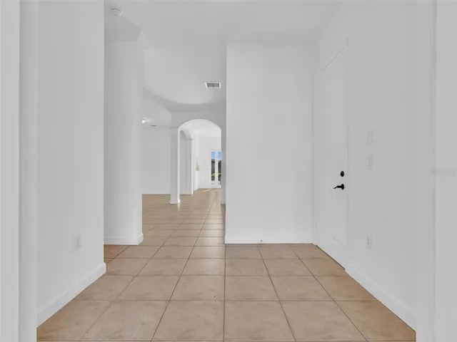 a view of a hallway with closet