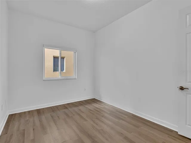 a bathroom with a toilet and a bath tub