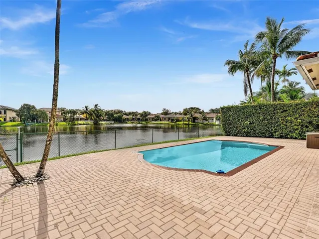 a view of a house with a swimming pool