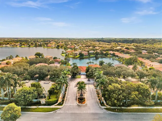 an aerial view of a city with ocean view