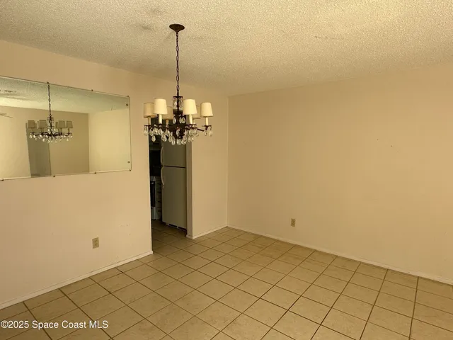 a view of a kitchen with a sink