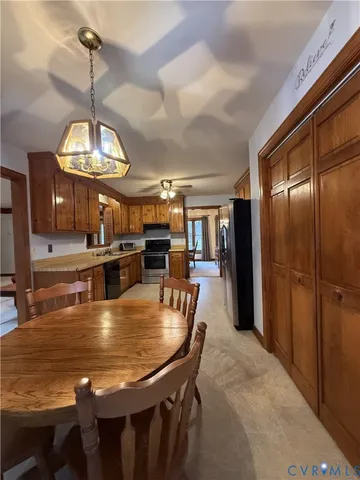 a view of a dining room with furniture