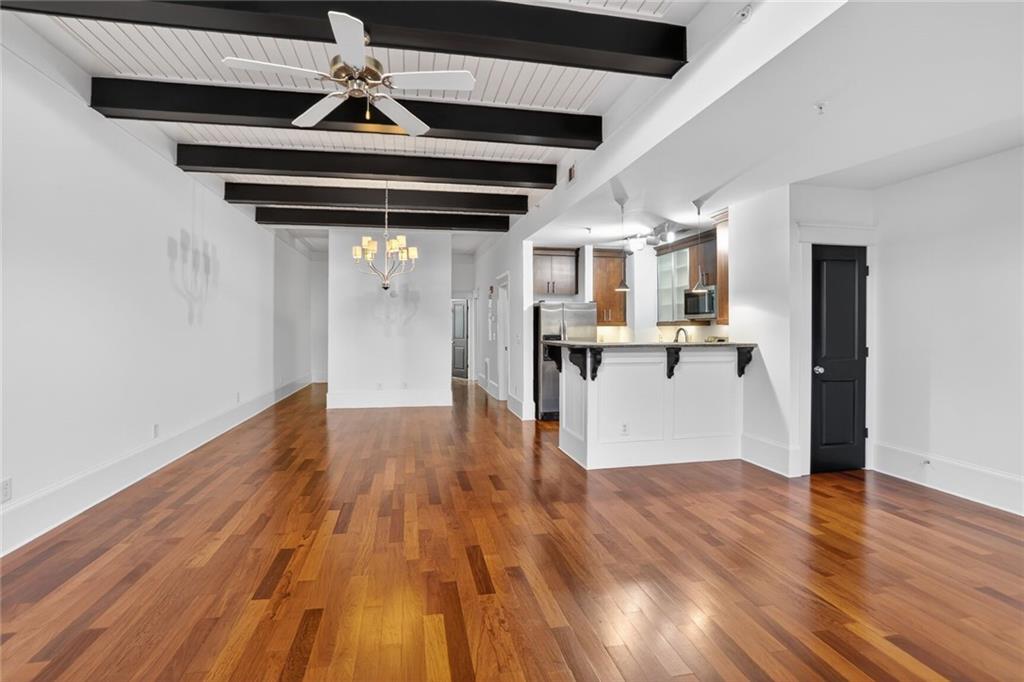 1860 Gordon Manor Northeast, Unit 110 Atlanta, GA 30307 - Photo 10 of 20 a view of a livingroom with wooden floor