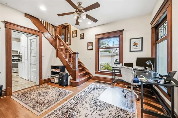 a living room with furniture and a rug
