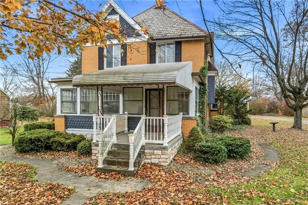 a house view with a garden space