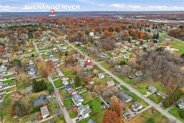 a view of city with ocean