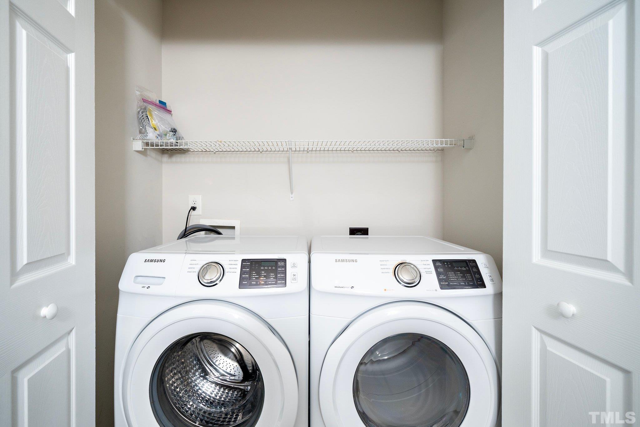 3121 Manhasset Lane Raleigh, NC 27604 - Photo 19 of 25 a utility room with dryer and washer