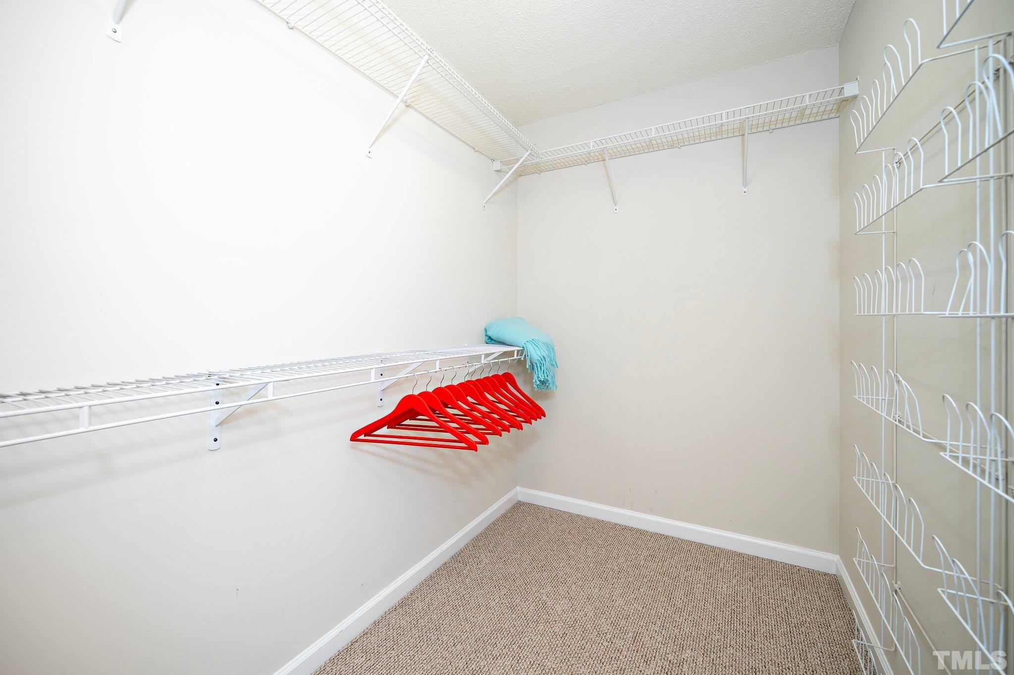 3121 Manhasset Lane Raleigh, NC 27604 - Photo 21 of 25 a bathroom with a shower and a shower curtain
