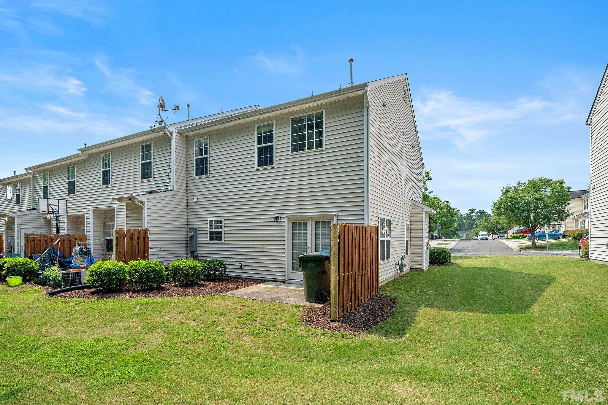 3121 Manhasset Lane Raleigh, NC 27604 - Photo 23 of 25 a front view of house with yard and green space