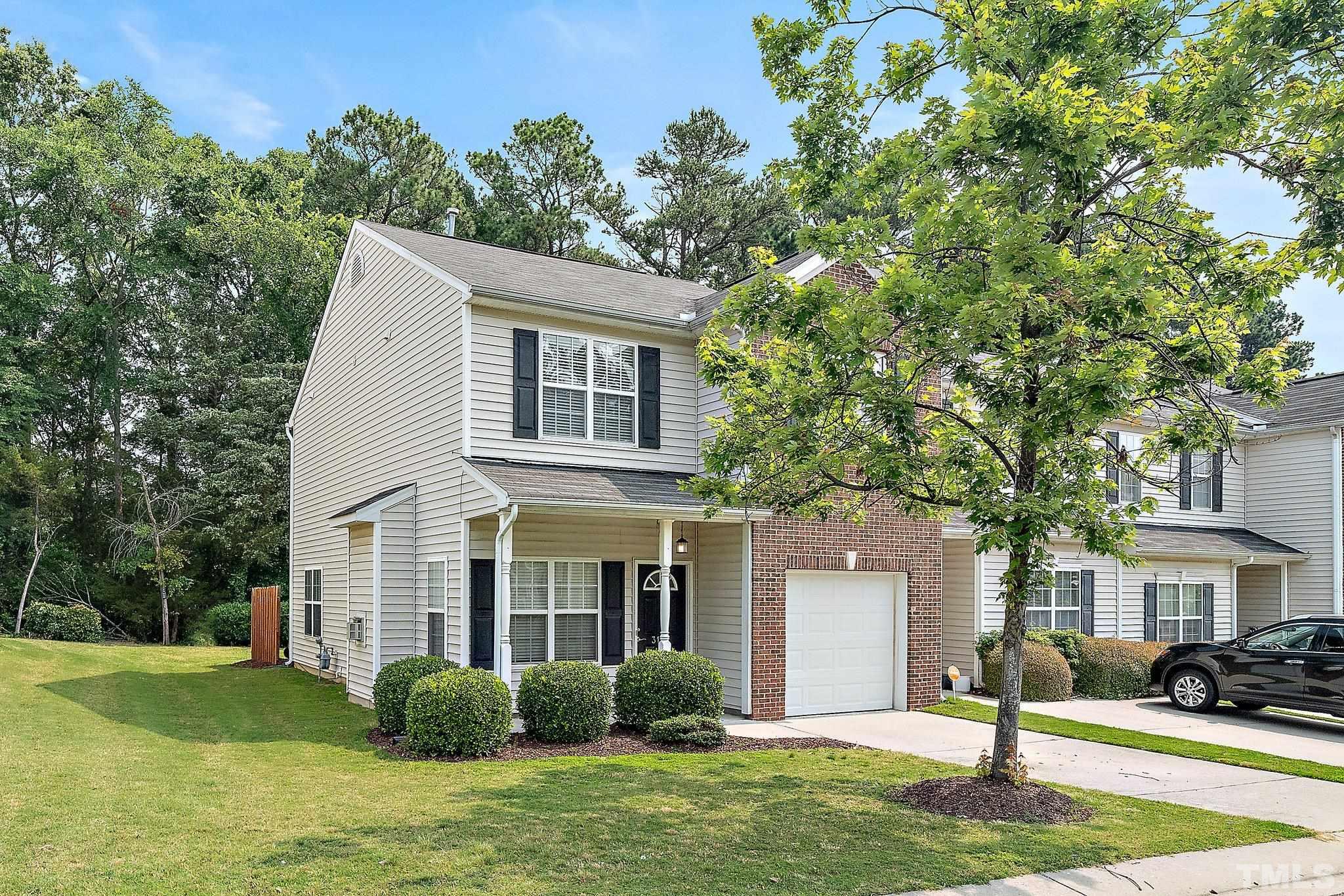 3121 Manhasset Lane Raleigh, NC 27604 - Photo 3 of 25 a front view of a house with garden