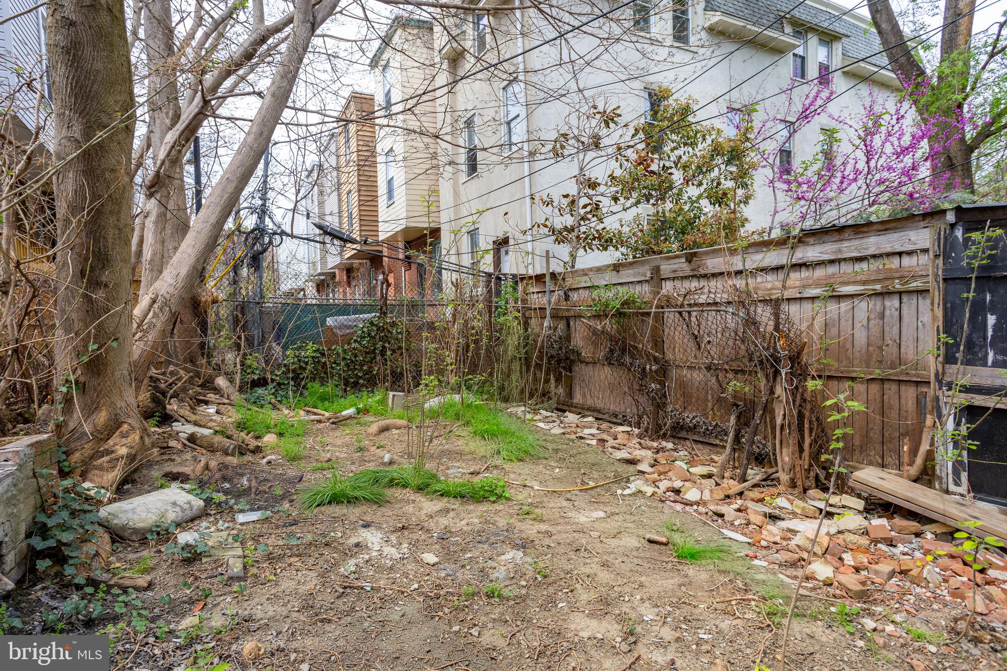 5109 Chester Avenue Philadelphia, PA 19143 - Photo 6 of 34 a backyard of a house with lots of green space