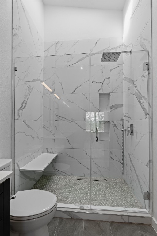 5601 Manor Road, Unit A Austin, TX 78723 - Photo 14 of 35 a bathroom with a toilet and a shower