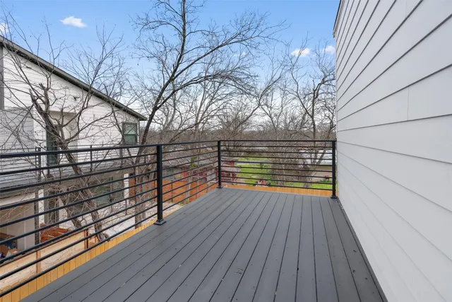 a view of outdoor space with deck and wooden floor