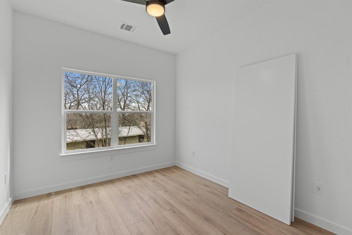 5601 Manor Road, Unit A Austin, TX 78723 - Photo 25 of 35 an empty room with a window