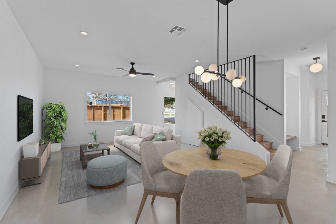 5601 Manor Road, Unit A Austin, TX 78723 - Photo 5 of 35 a view of a dining room with furniture window and wooden floor