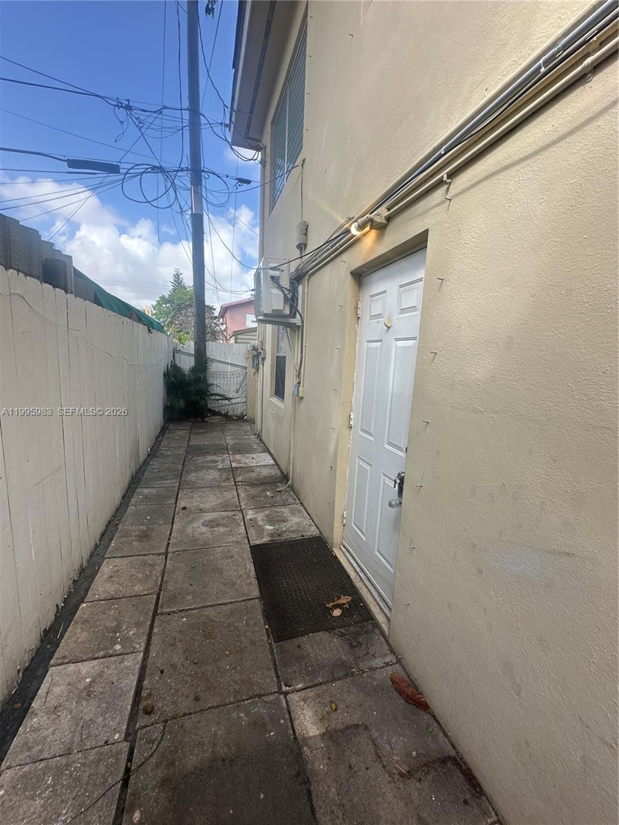 2420 Southwest 34th Avenue, Unit A Miami, FL 33145 - Photo 5 of 15 a view of a pathway