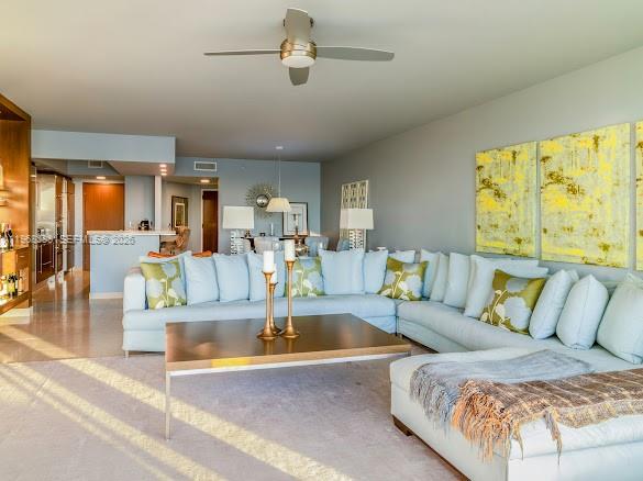 450 Alton Road, Unit 1202 Miami Beach, FL 33139 - Photo 5 of 68 a living room with furniture and wooden floor
