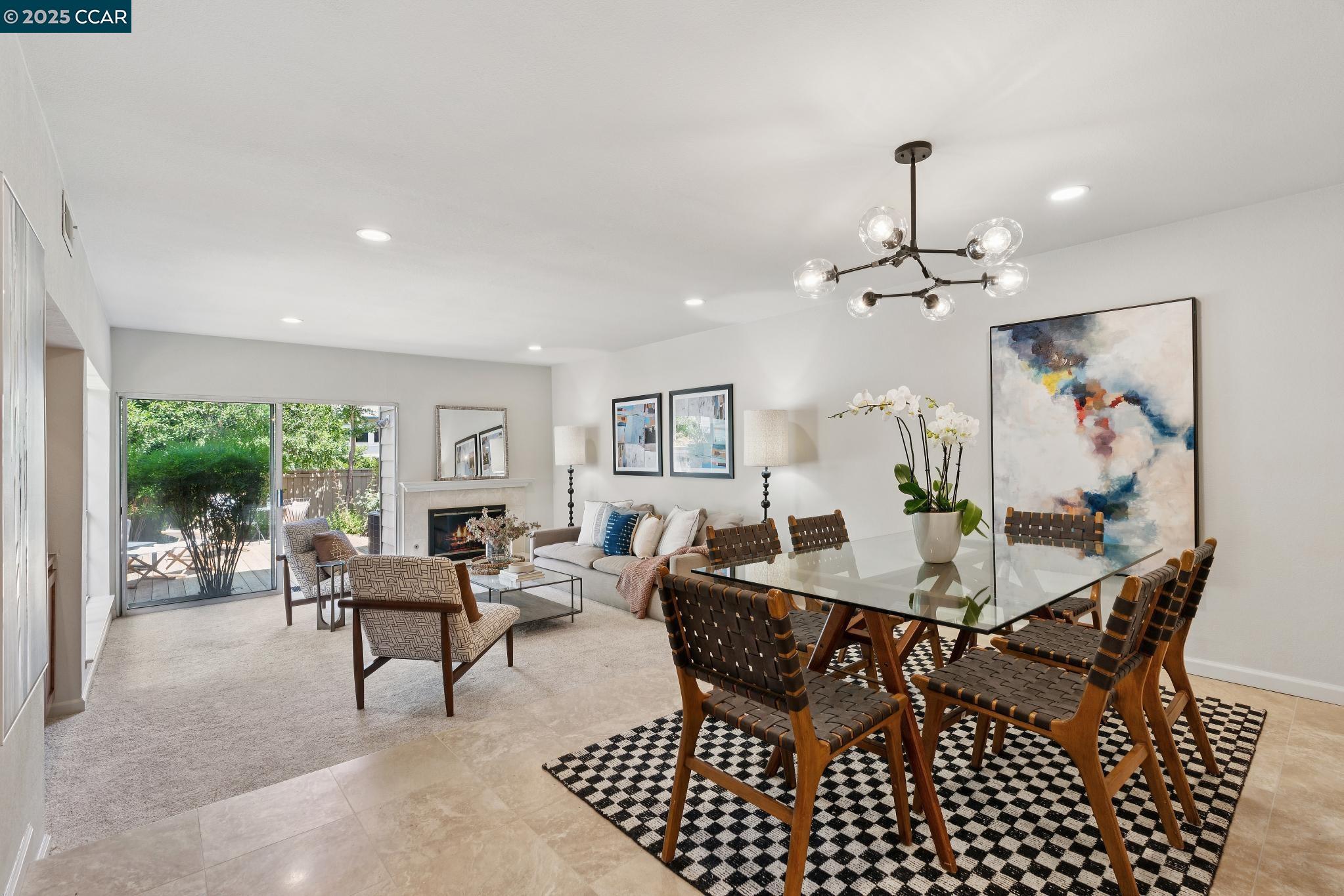 a view of a dining room with furniture window and outside view