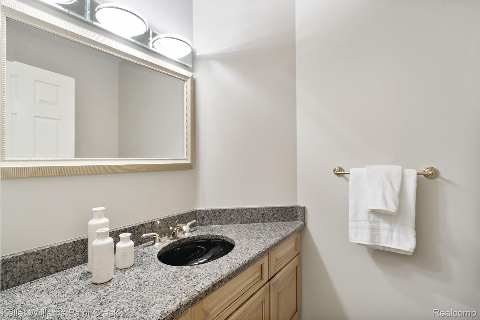 3473 Moceri Court Rochester, MI 48306 - Photo 31 of 58 Granite counters in the powder room