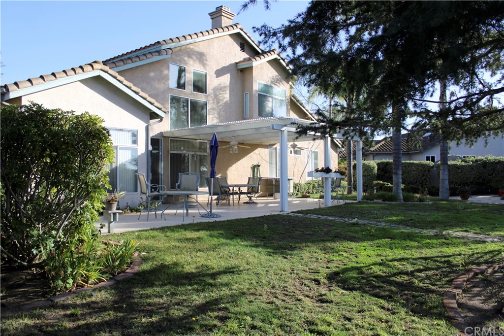 1299 Cll Sonia Fallbrook, CA 92028 - Photo 25 of 29 a front view of a house with a yard table and chairs